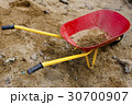 small wheelbarrow or barrow with sand - playground 30700907