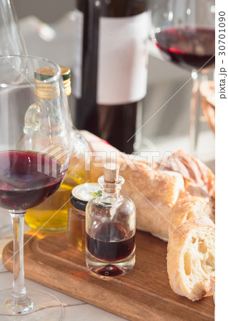 Wine, baguette and cheese on wooden background Wine, baguette and cheese on wooden background 30701090
