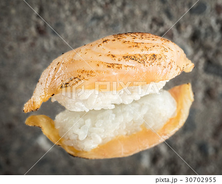 Burned nigiri sushi with sea bass 30702955
