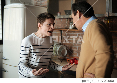 Free teenager shouting at his father Free teenager shouting at his father 30703868