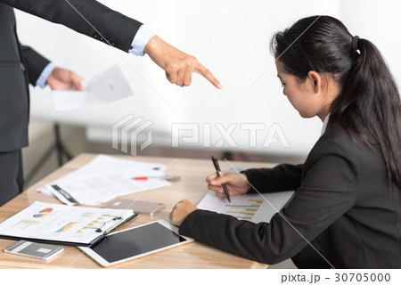 Angry employer expressing fierce in the office 30705000