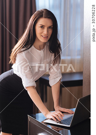 Confident attractive businesswoman looking at you Confident attractive businesswoman looking at you 30706228