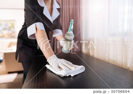Duster being used by a professional chambermaid 30706604