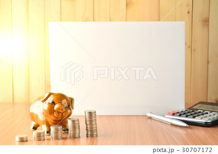 Stack coins, calculator and piggy bank Stack coins, calculator and piggy bank 30707172