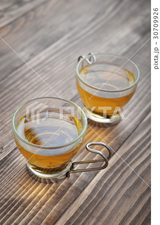 Green tea in a glass small cups 30709926