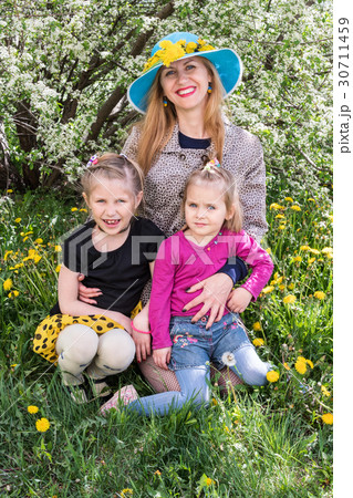 Portrait of mother with her daughters 30711459