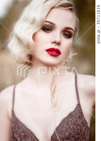 Beautiful and elegant smiling sexy blonde woman  30711616