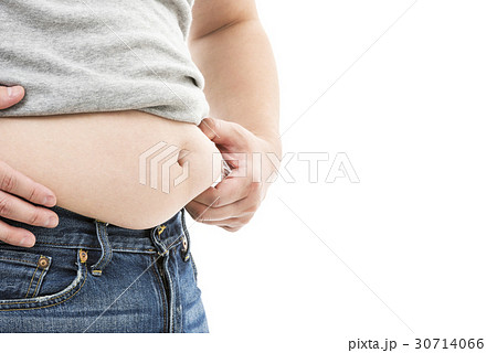 お腹の贅肉をつまむ太った男性 お腹の贅肉をつまむ太った男性 30714066