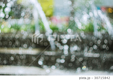 circular bokeh is blue in the blue background 30715842