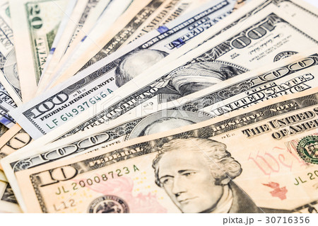 10 and 100 us dollar banknote close up 10 and 100 us dollar banknote close up 30716356