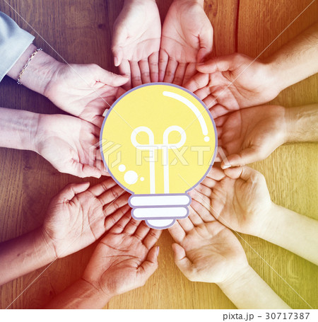 Hands Show Light Bulb Ideas Together Partnership Hands Show Light Bulb Ideas Together Partnership 30717387