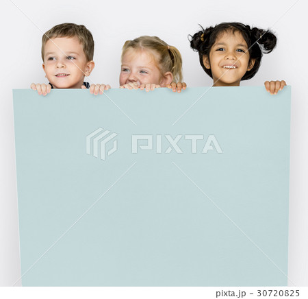 Little Children Holding Empty Paper Smiling 30720825