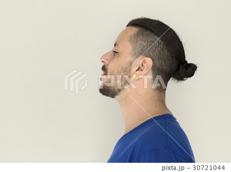 Man with cool hairstyles is in a studio shoot Man with cool hairstyles is in a studio shoot 30721044