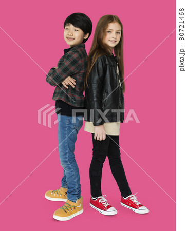 Boy and girl are posing on a shoot 30721468
