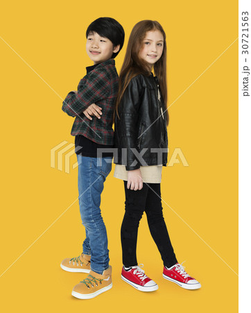 Boy and girl are posing on a shoot 30721563