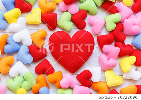 Colorful heart shape on white wooden plank background. For love or valentine day concept Colorful heart shape on white wooden plank background. For love or valentine day concept 30722090