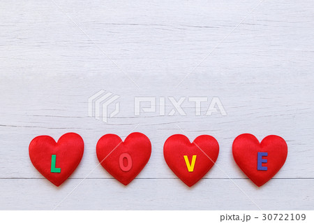 Top view red heart on white wooden plank. For love or valentine day concept Top view red heart on white wooden plank. For love or valentine day concept 30722109