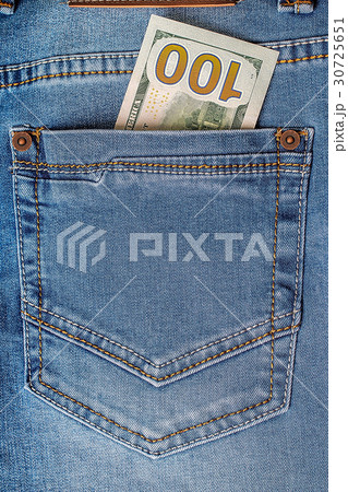 Dollar banknotes in jeans pocket closeup. 30725651