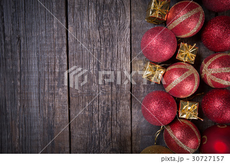 New year balls frame on rustic wooden background 30727157