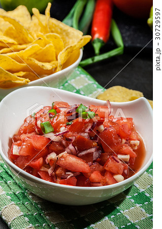 Bowl of fresh salsa with tortilla chips Bowl of fresh salsa with tortilla chips 30729597