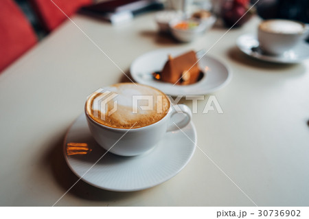 Latte on the table 30736902