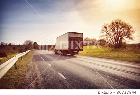 lorry moving on sunny evening lorry moving on sunny evening 30737844