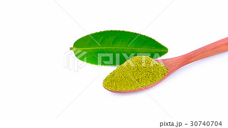 green tea power and green tea leaf isolated on green tea power and green tea leaf isolated on 30740704