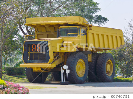 Coal mining. Yellow mining truck. 30740731