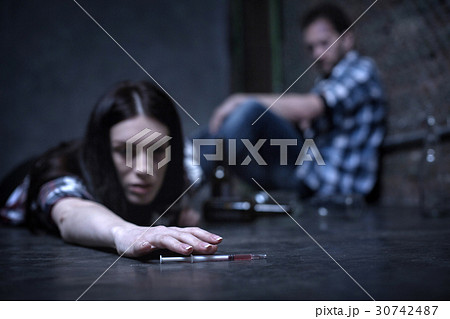 Hopeless mature addict suffering from overdose in Hopeless mature addict suffering from overdose in 30742487