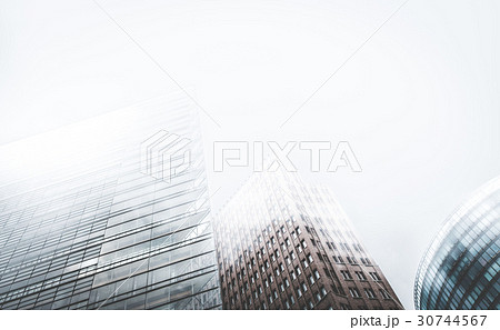 Skyscraper buildings in misty fog - architecture 30744567