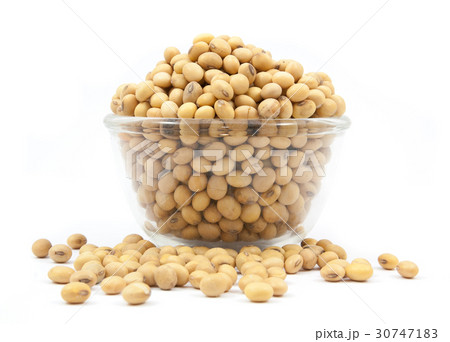 Dried soybean on glass cup isolated 30747183