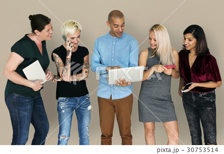 Happiness group of people smiling and conneted by digital devices Happiness group of people smiling and conneted by digital devices 30753514