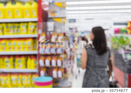 Blurred image of a woman with a shopping. Blurred image of a woman with a shopping. 30754677
