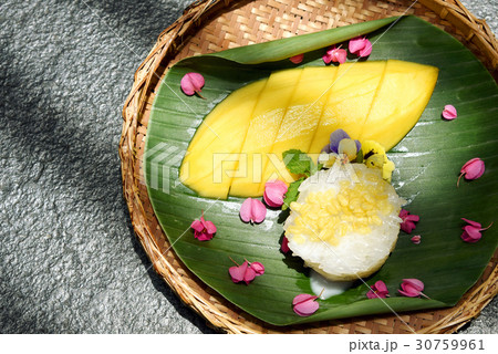 Mango and sticky rice, Sweet thai style dessert. Mango and sticky rice, Sweet thai style dessert. 30759961