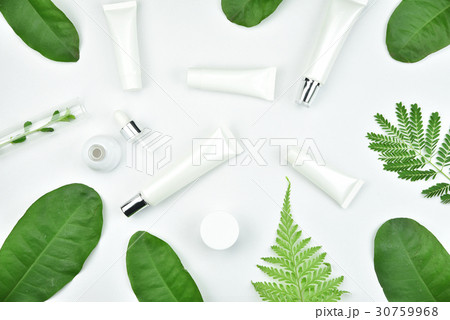 Cosmetic bottle containers with herbal leaves. Cosmetic bottle containers with herbal leaves. 30759968
