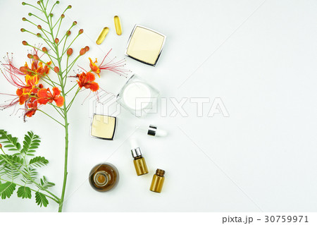 Cosmetic bottle containers with herbal leaves. 30759971