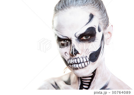 Girl with creative halloween face art on white 30764089
