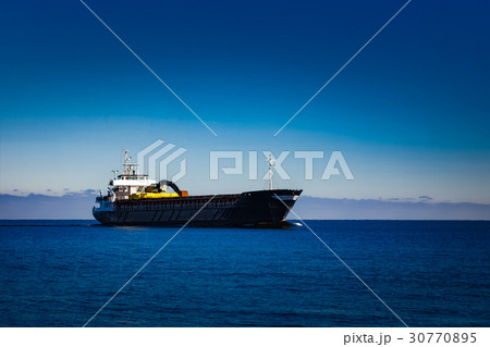 Black cargo ship Black cargo ship 30770895