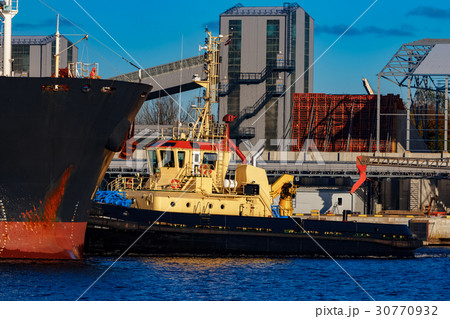 Black cargo ship mooring Black cargo ship mooring 30770932
