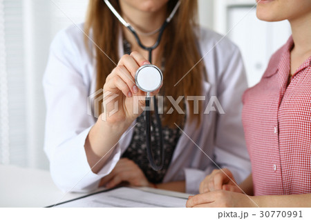 Doctor with a stethoscope in the hand. Physician 30770991