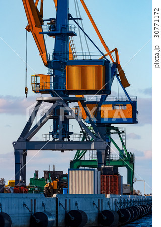 Yellow cargo cranes 30771172