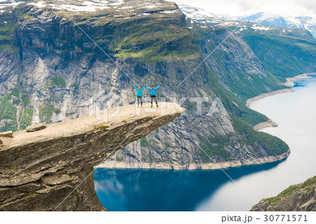 Couple posing on Trolltunga Norway 30771571