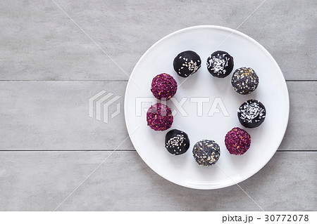 Fitness energy bites, raw chocolate truffles  30772078