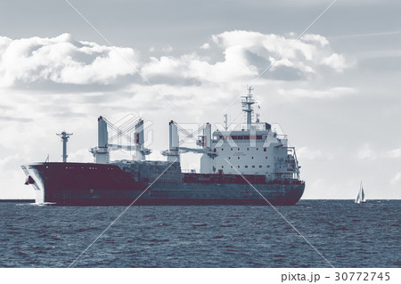 Cargo ship moving 30772745