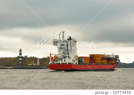 Red cargo container ship 30773439