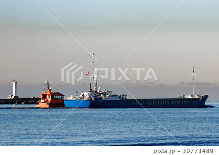 Blue cargo ship 30773489