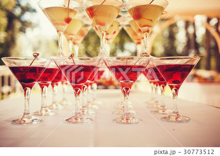 Glasses of cocktails Glasses of cocktails 30773512