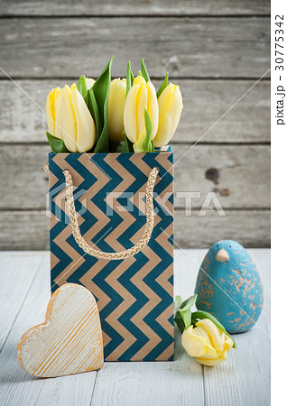 yellow tulips in kraft package yellow tulips in kraft package 30775342