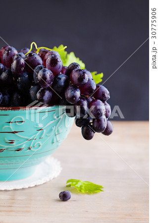 Grape with Green Leaves on Vintage Background 30775906