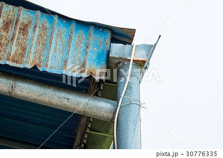 Corner of the house with gutters zinc 30776335